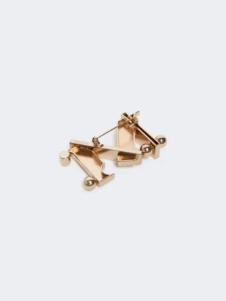 Metalowa broszka z monogramem, złota Metalowa broszka z monogramem, złota