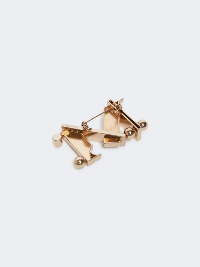 Metalowa broszka z monogramem, złota Metalowa broszka z monogramem, złota