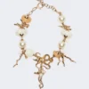Naszyjnik typu choker „Abissi” z metalu i rafii, złoty Naszyjnik typu choker „Abissi” z metalu i rafii, złoty