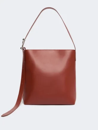 Skórzana torba typu shopper z klamrą w kształcie litery S, kolor rdzawy